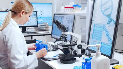 Wall Mural - Professional team of scientists is working on a vaccine in a modern scientific research laboratory. Genetic engineer workplace. Future technology and science.