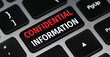 © piksik - Confidential information text on a keyboard. Technology and business concept.