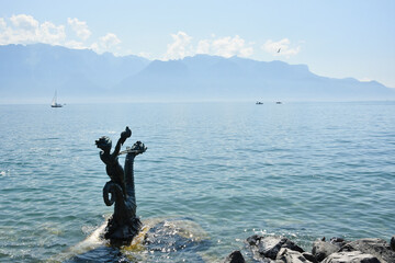 Wall Mural - Blue tranquil landscape on Leman (Geneva ) Lake at Vevey, Switzerland