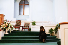 Black Woman Praying At Church To God