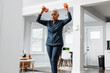 © Gerald R Carter Jr/Creative Flame - Senior Black woman exercising at home, active lifestyle fitness