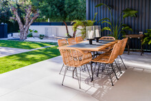 Chairs And Table Arranged In Patio