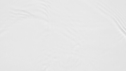 Poster - Up close, top view, various waves of the water surface hitting the sun's rays, making them sparkle according to different patterns on a gray background.