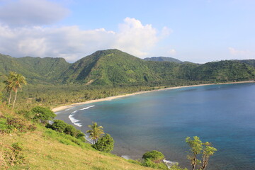 Beautiful Malimbu beach and mountain in Lombok island Indonesia