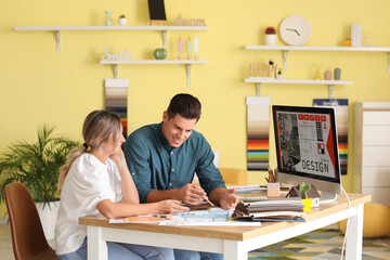 Poster - Male interior designer with client in his office