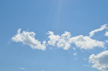 white clouds on blue sky background