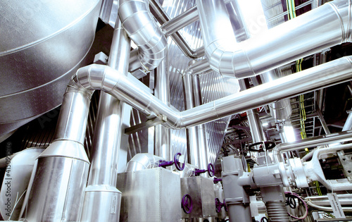 Obraz Dibond Equipment, cables and piping as found inside of a modern industrial power plant