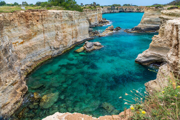 Poster - Italy, Apulia, Province of Lecce, Melendugno. The Faraglioni (limestone stacks) of Torre Sant'Andrea. Eroded limestone cliffs above the Adriatic Sea.