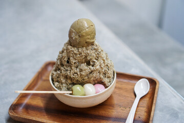 Wall Mural - Houjicha (Japanese green tea) kakigori, shaved ice in Japanese style topped with houjicha ice-cream and three dango.