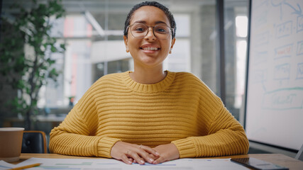 Aufkleber - Point of View from Camera Portrait of a Beautiful Multiethnic Latina Project Manager Having Video Call in Creative Office Environment. Happy Female Specialist Listening to Colleague Over Live Camera.