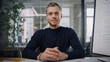 © Gorodenkoff - Point of View from Camera with Handsome Young Project Manager Making a Video Call in Creative Office Environment. Happy Caucasian Male Specialist Talking to Colleague Over a Live Camera.