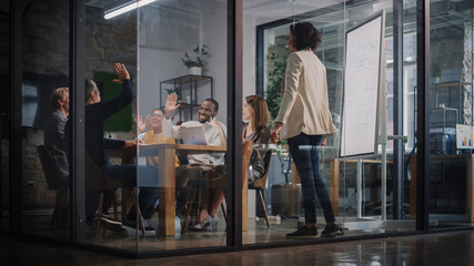 Aufkleber - Project Manager Makes a Presentation for a Young Diverse Creative Team in Meeting Room in an Agency. Colleagues Sit Behind Conference Table and Discuss Business Development, User Interface and Design.