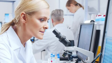 Wall Mural - professional team of scientists is working on a vaccine in a modern scientific research laboratory. 