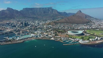 covid-19 lockdown empty football stadium aerial in cape town south africa.