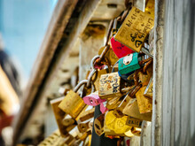 Romantic Love Locks On A Bridge Railing In Paris In Shallow Focus