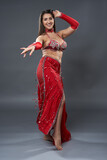 Arab belly dancer on gray  background
