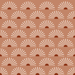 Abstract vector seamless pattern with mid-century minimalist design: terracotta suns with light rays. Sunrise or a sunset on a beige background