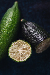 Wall Mural - Bunch of fresh tasty finger limes fruits