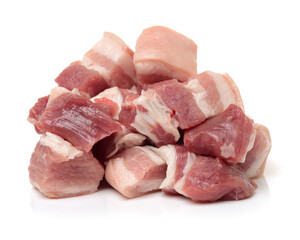 Raw pork belly pieces on a white background