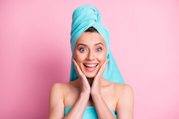 Sticker - Portrait of impressed nice young lady hands face wear teal bath towels on head body isolated on pink color background