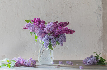 bouquet of lilacs in a glass jug