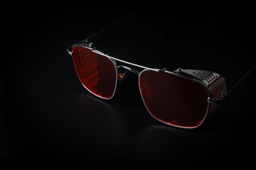 kid's metal sunglasses isolated on black background	
