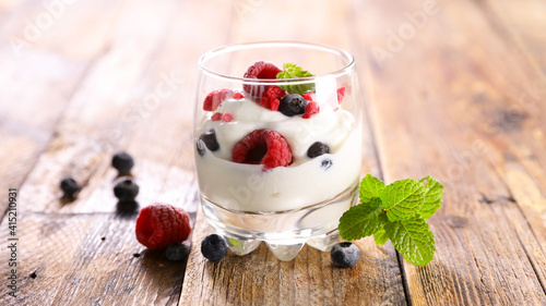 yogurt with berries fruits- blueberry and raspberry © M.studio