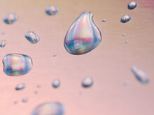 Macro Of Reflecting Water Drops On Pastel Color Background