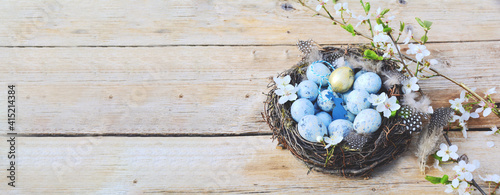 eggs in a basket on wooden table - easter background banner, greeting card © S.H.exclusiv
