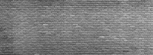 Old Gray Brick Wall Textured Background.  A High Resolution Panoramic Image