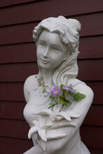 Statue With Flower