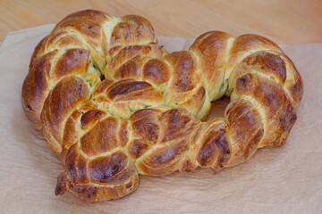 Wall Mural - A braided challah brioche bread shaped as a heart