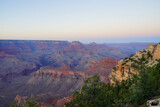 Fototapeta Natura - Golden Sunset at Grand Canyon Arizona. Blue smoky haze accentuates the canyon