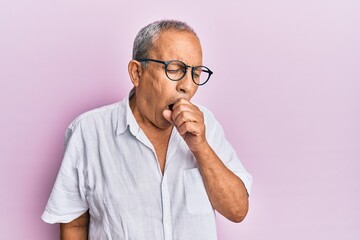 Sticker - Handsome mature senior man wearing casual shirt and glasses feeling unwell and coughing as symptom for cold or bronchitis. health care concept.