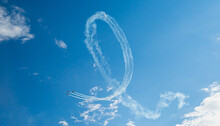 Stunt Aircrafts Performing Incredible Aerobatics. Aerial Manoeuvre Stunts. Planes Does Loop Stunt With Smoke Trails
