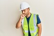 © Krakenimages.com - Handsome man with beard wearing safety helmet and reflective jacket feeling unwell and coughing as symptom for cold or bronchitis. health care concept.
