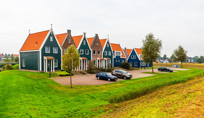 Wall Mural - Volendam is a town in North Holland in the Netherlands. Colored houses of marine park in Volendam. North Holland, Netherlands..