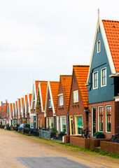 Wall Mural - VOLENDAM, NETHERLANDS. Typical Dutch village houses in Volendam. Beautiful village houses facade..