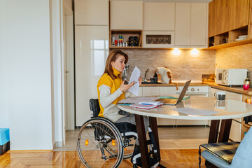 Wall Mural - Woman with disabilities working at home