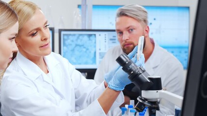 Wall Mural - professional team of scientists is working on a vaccine in a modern scientific research laboratory. 
