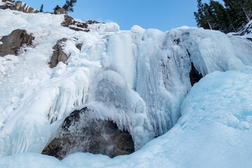 Wall Mural - Frozen Tangle Creek Falls in Jasper National park, Canada