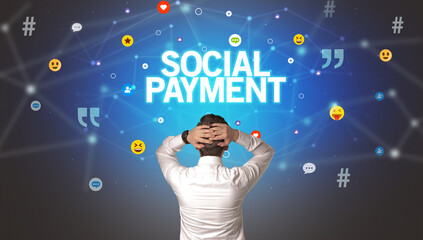rear view of a businessman with social payment inscription, social networking concept