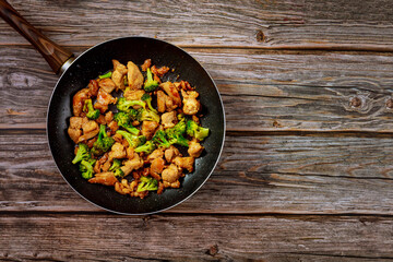 Wall Mural - Chinese delicious dish stir-fry chicken with broccoli.