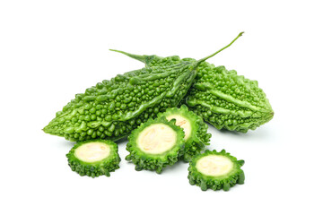 Bitter melon or Bitter gourd with slices on white background