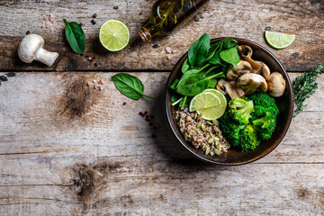 Canvas Print - Diet salad made from fresh vegetables broccoli, mushrooms, spinach and quinoa in a bowl. Delicious breakfast or snack, Clean eating, dieting, vegan food concept. top view