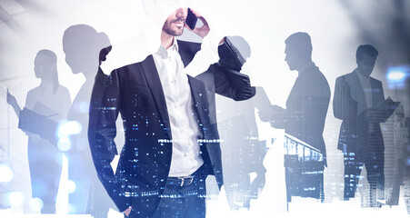 Poster - Silhouettes of business people working and rushing in office space, New York city panorama. CEO on foreground is conducting conference call using smart pohone. Work hard concept. Double exposure