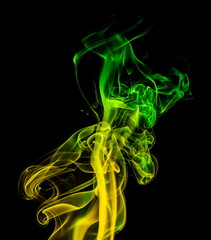 Colored smoke on black background