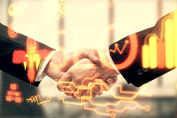 Double exposure of SEO hologram and handshake of two men. Search optimization concept.