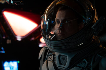 Wall Mural - portrait of caucasian male astronaut inside spaceship cockpit. sci-fi space exploration concept. mar