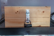 Wooden Box With A Padlock